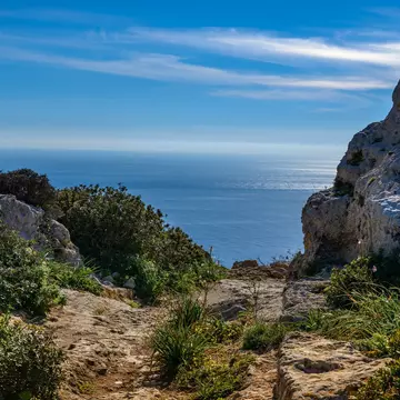 A path through the rocky landscape at Malta's Dingli Cliffs