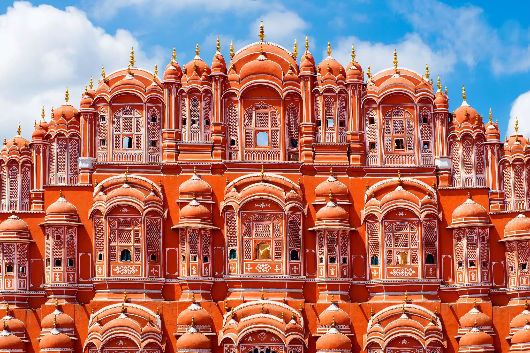 The pink facade of the Hawa Mahal in Jaipur, Rajasthan.