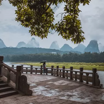 GettyImages-1033382930.jpg
Scenic landscape at Yangshuo County of Guilin, China. View of beautiful karst mountains and the Li River (Lijiang River) with azure water. Amazing green hills on background.