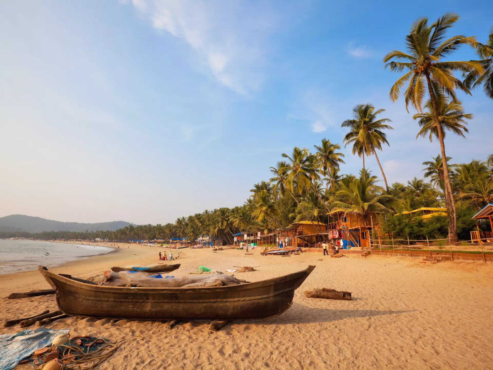 From buying street food to traveling on overnight trains, these tips can help your money go further in India. Tobias Helbig/Getty Images