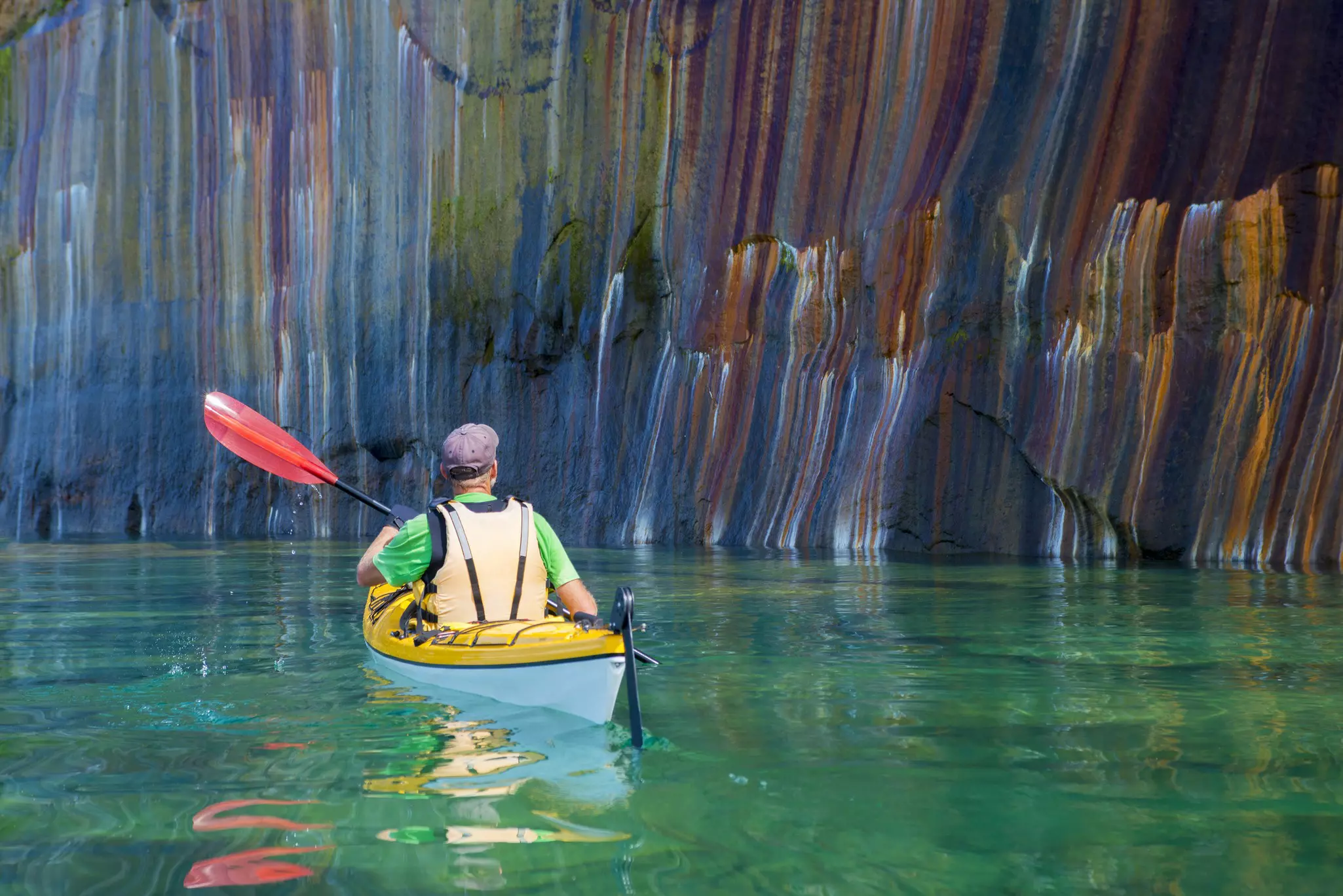 Kayaking is a great way to get closest to the yellow sandstone cliffs of Pictured Rocks National Lakeshore © Michael Olson / Getty Images