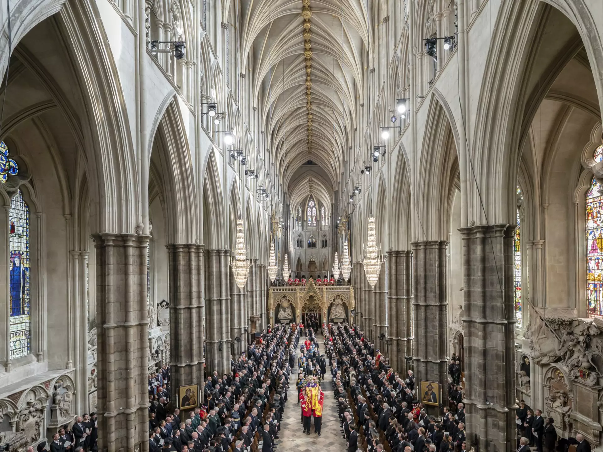 LONDON, ENGLAND - SEPTEMBER 19: King Charles III, the Queen Consort, the Princess Royal, Vice Admiral Sir Tim Laurence, the Duke of York, the Earl of Wessex, the Countess of Wessex, the Prince of Wales, the Princess of Wales, Prince George, Princess Charlotte, the Duke of Sussex, the Duchess of Sussex, Peter Phillips and the Earl of Snowdon follow behind the coffin of Queen Elizabeth II, draped in the Royal Standard with the Imperial State Crown and the Sovereign's orb and sceptre, as it is carried out of Westminster Abbey after her State Funeralon September 19, 2022 in London, England.  Elizabeth Alexandra Mary Windsor was born in Bruton Street, Mayfair, London on 21 April 1926. She married Prince Philip in 1947 and ascended the throne of the United Kingdom and Commonwealth on 6 February 1952 after the death of her Father, King George VI. Queen Elizabeth II died at Balmoral Castle in Scotland on September 8, 2022, and is succeeded by her eldest son, King Charles III. (Photo by Danny Lawson - WPA Pool/Getty Images)
1243370187