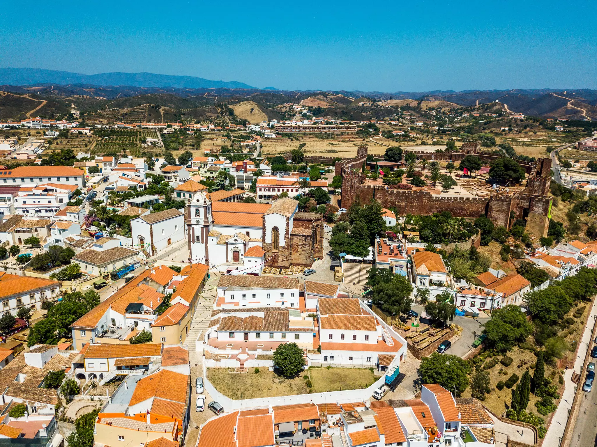 Aerial view of Silves with Moorish castle and historic cathedral, Algarve, Portugal