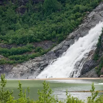 Nugget Creek falls cascade into Mendenhall Lake close to Juneau in Alaska; Shutterstock ID 2181780629;