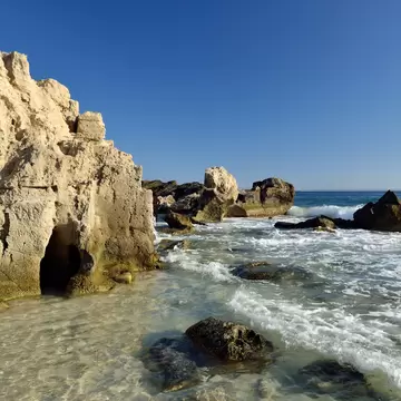 Stone beach Salines on Ibiza. Balearic Islands. Spain; Shutterstock ID 1387168433; your: Sloane Tucker; gl: 65050; netsuite: Online Editorial; full: POI