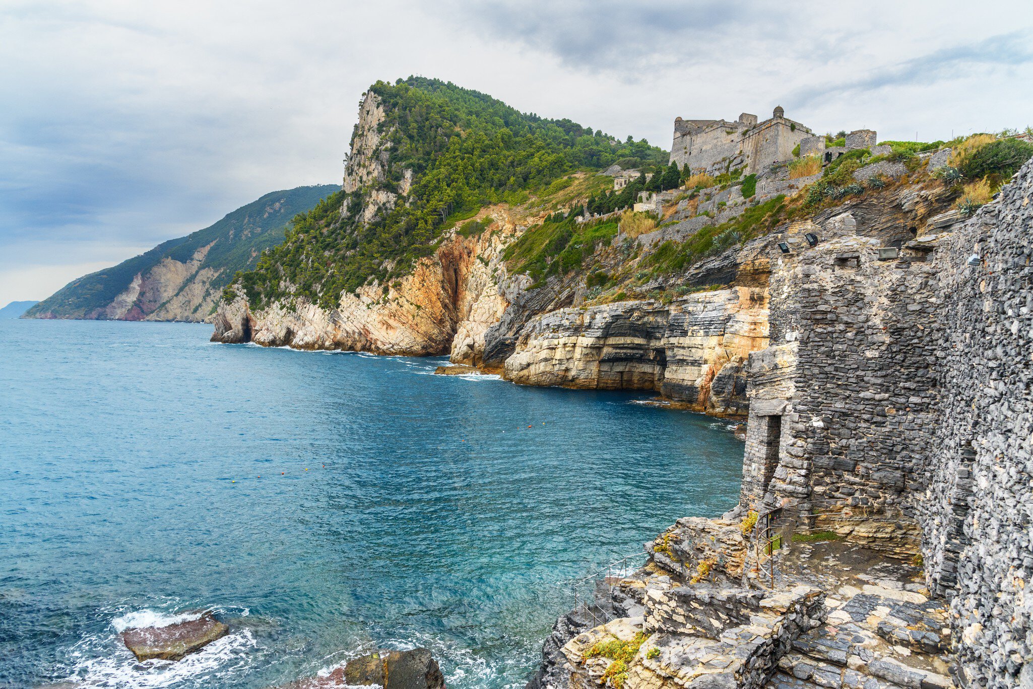 Cliff sea coast with Grotta di Lord Byron in Portovenere or Porto Venere town on Ligurian coast. Province of La Spezia. Italy