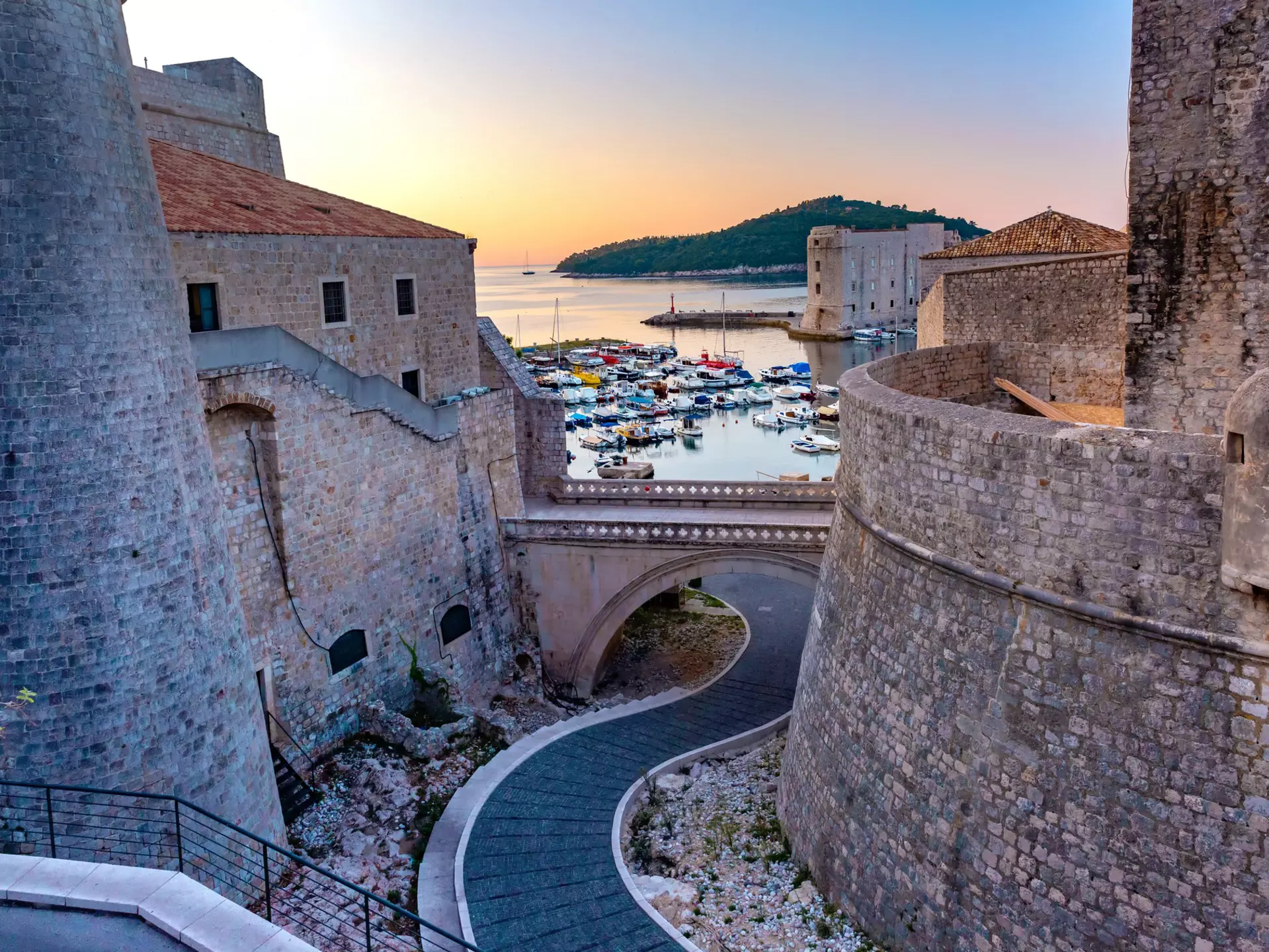 Dubrovnik's city walls and harbor. kavalenkava/Shutterstock