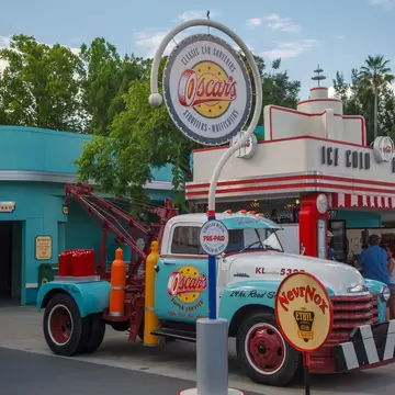 A vintage pick-up truck and food kiosk at Hollywood Studios, Disney World, Florida, USA.