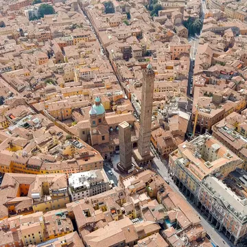 Bologna, Italy. Old Town. Two Towers. (Le due Torri) Garisenda and degli Asinelli. Towers from the 12th century. Summer, Aerial View  , License Type: media, Download Time: 2025-12-01T16:26:37.000Z, User: dermothegarty77, Editorial: false, purchase_order: 56530 - Guidebooks, job: Global Publishing WIP, client: Western Europe 16, other: Dermot Hegarty