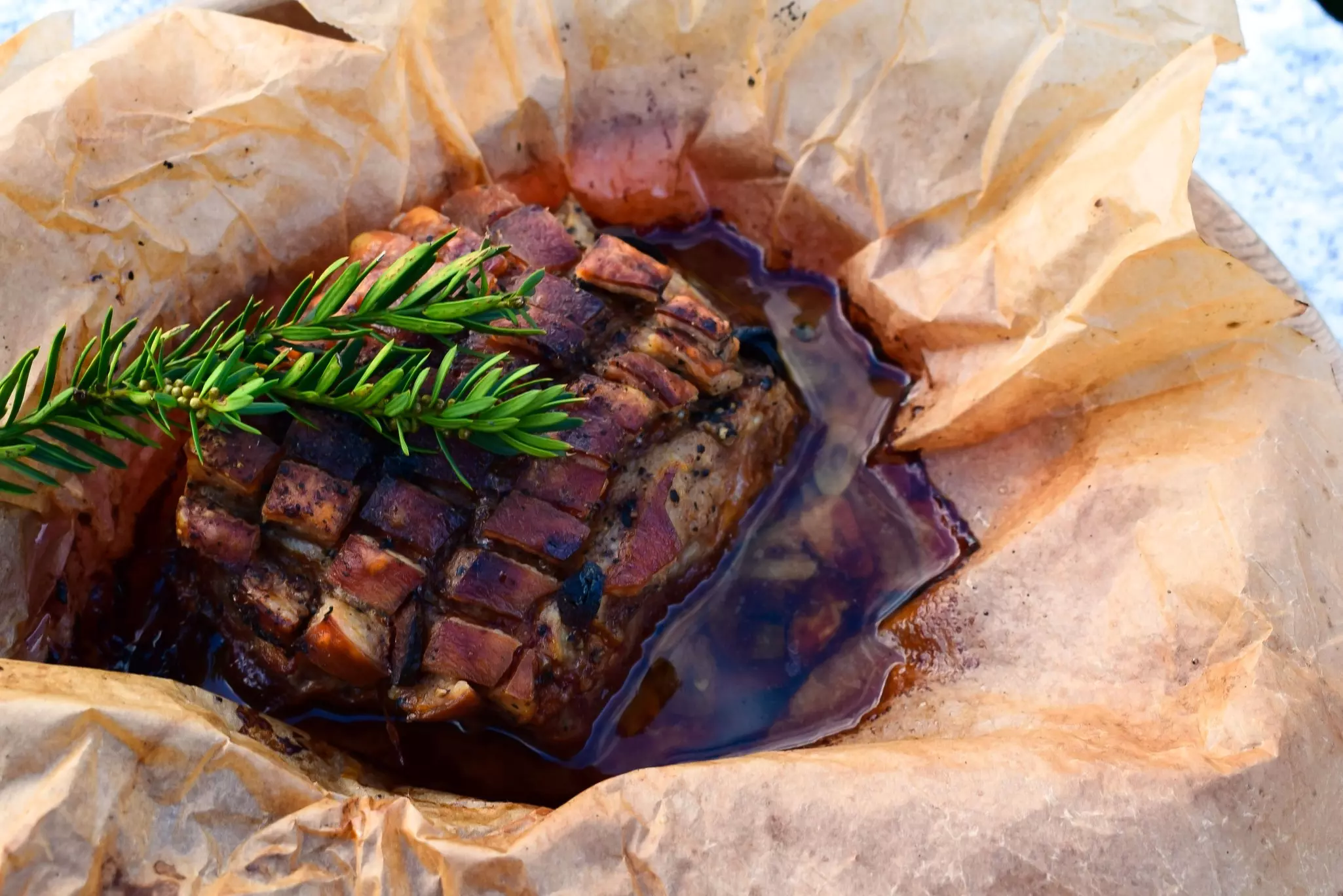 Traditional Norwegian Christmas dish 'Ribbe'. Pork ribs cooked in the oven with a thin layer of lard and skin.,
