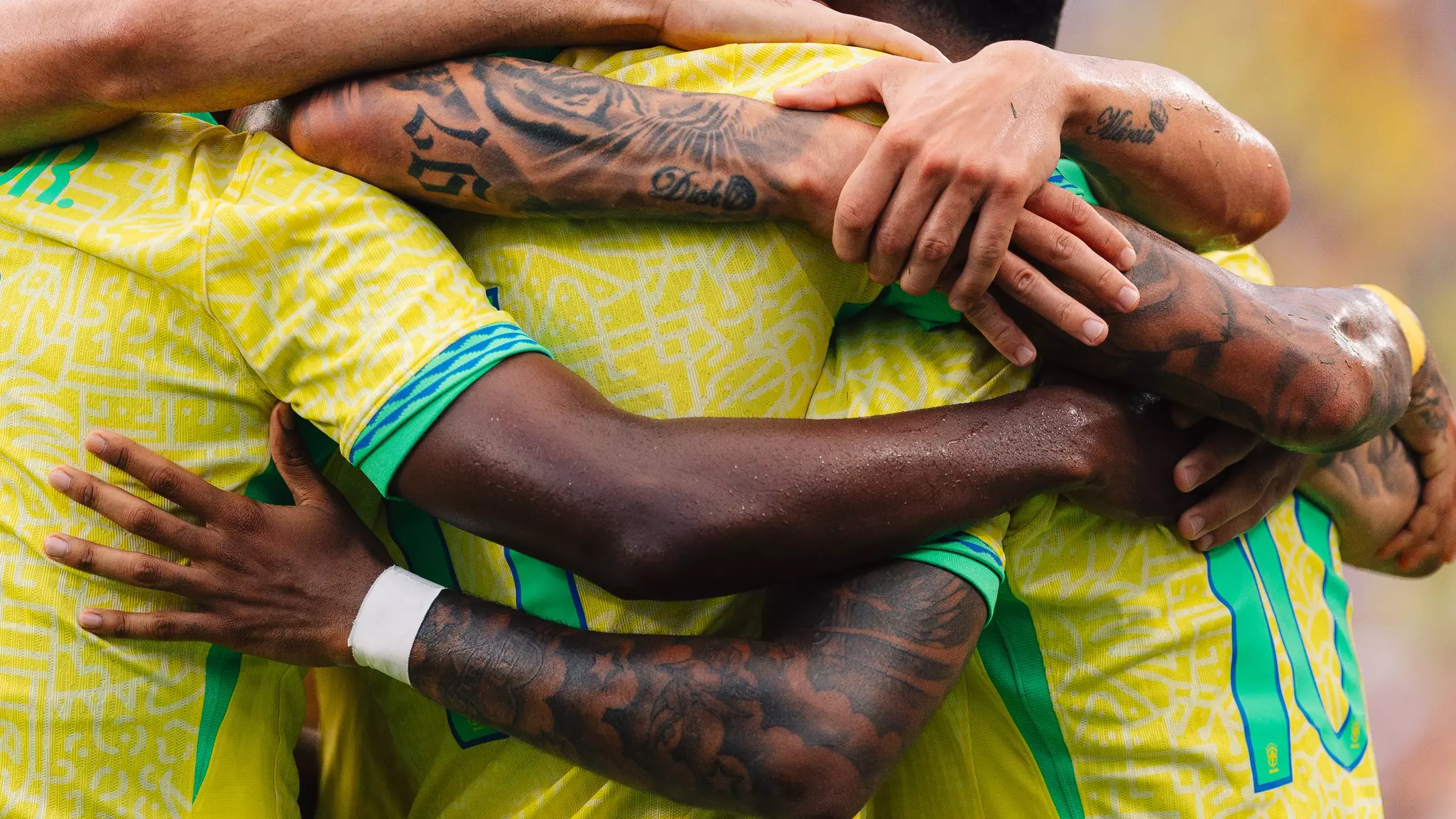 The Brazilian men’s national team embrace in celebration after scoring at a friendly match against the US men’s national team in Orlando, Florida.