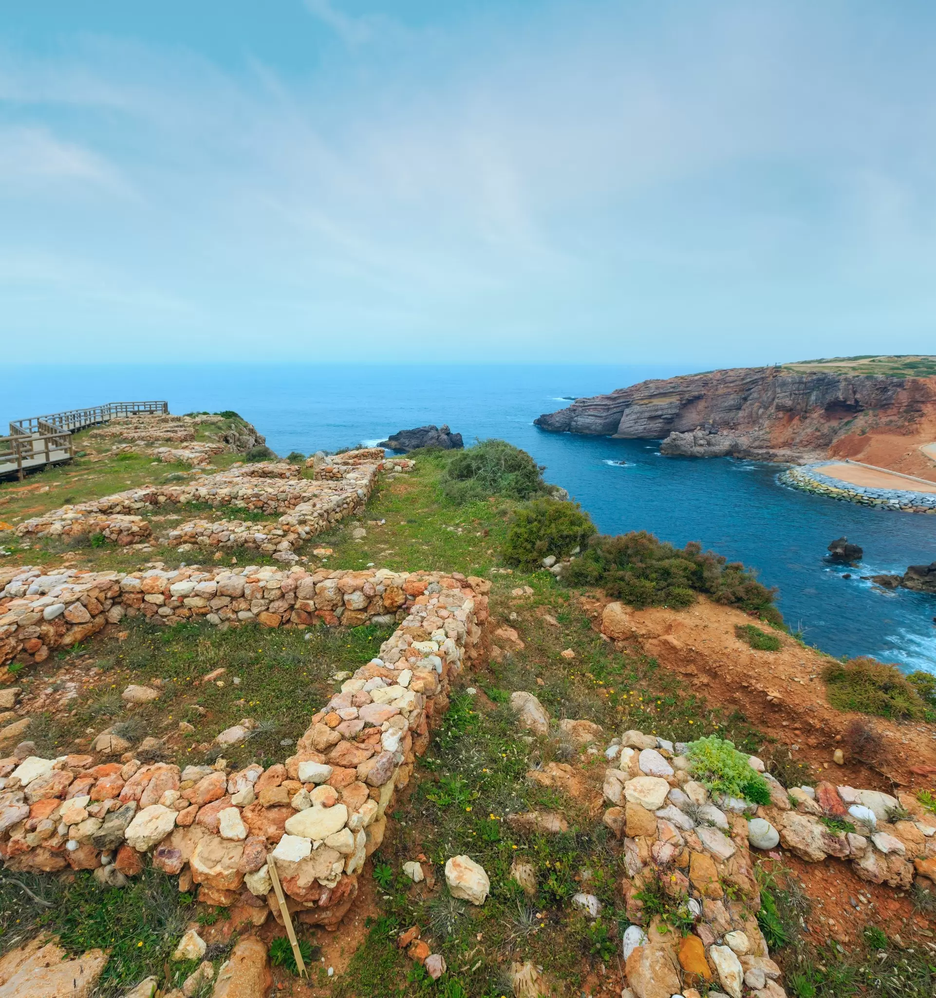 View of the ruins of an Islamic fishing village in Ponta do Castelo by Carrapateira in Portugal.