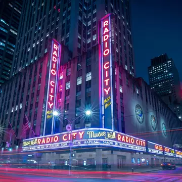 09.19.23. New York city, USA. illuminated Radio city music hall in Midtown of NYC near by Rockefeller center. Famous theater in Manhattan.  License Type: media  Download Time: 2023-11-24T16:38:10.000Z  User: FergalCo  Is Editorial: Yes  purchase_order:   