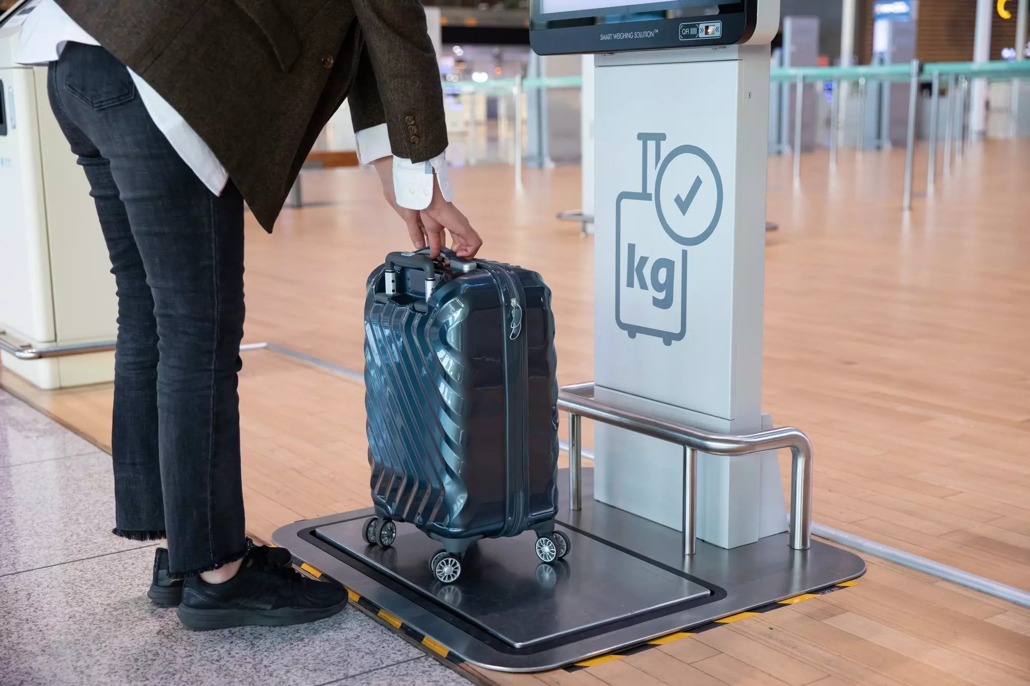For now, continue to scrutinize policies and carefully measure bags to avoid fees © bigshot01 / Shutterstock