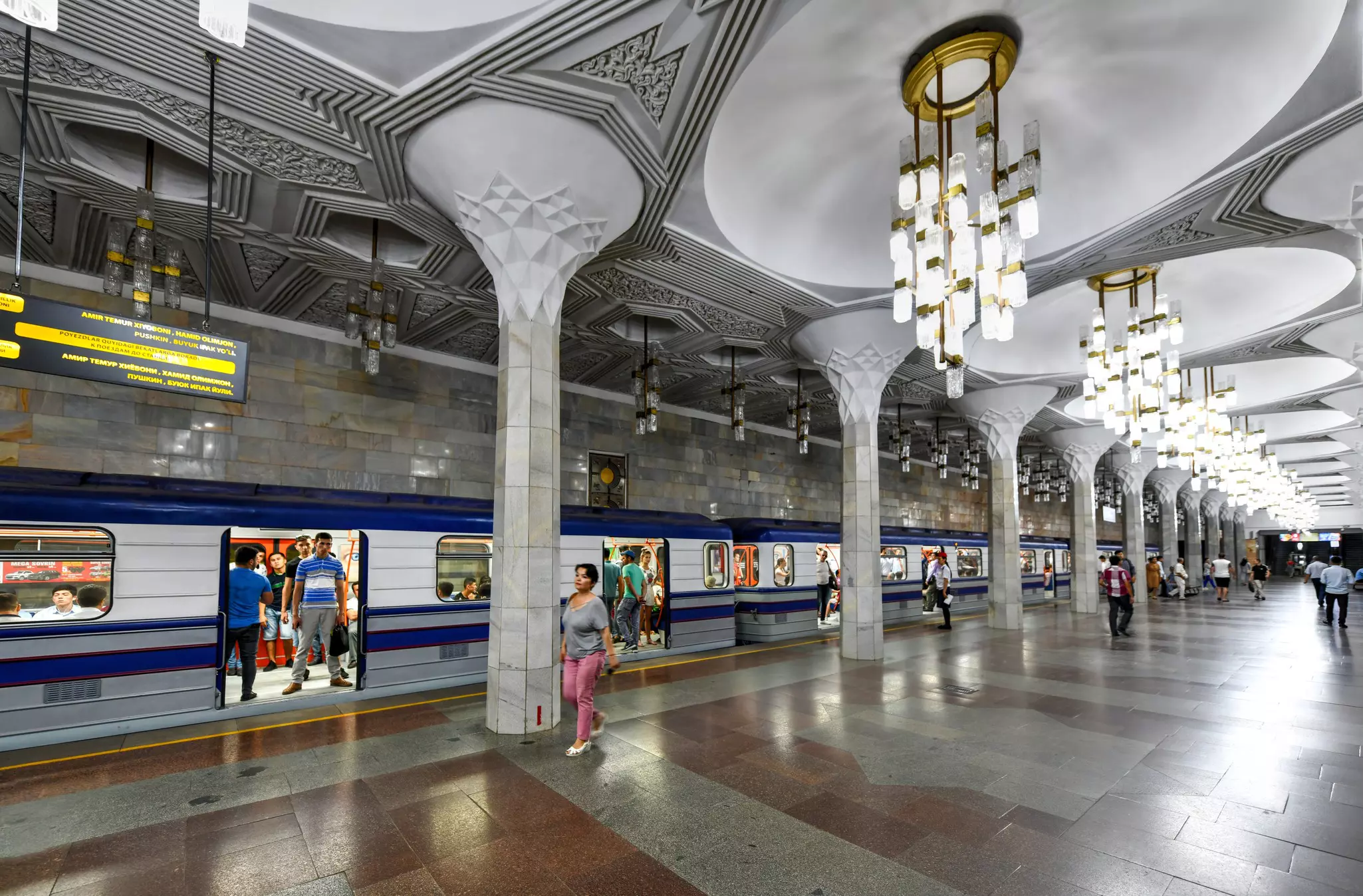 Commuters in an opulent station in the Tashkent Metro  © Felix Lipov / Shutterstock