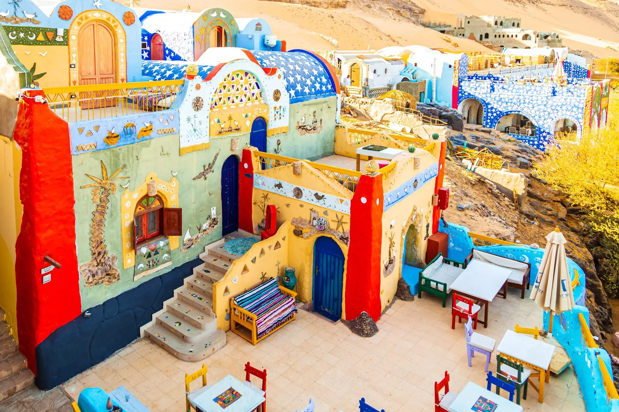 Colorful bright houses of the famous Nubian village. Aswan, Egypt – October 17, 2023, License Type: media, Download Time: 2025-06-20T13:09:59.000Z, User: oneseven7891, Editorial: true, purchase_order: 56530 - Guidebooks, job: Global Publishing WIP, client: Experience Egypt 1, other: Dominic Allen