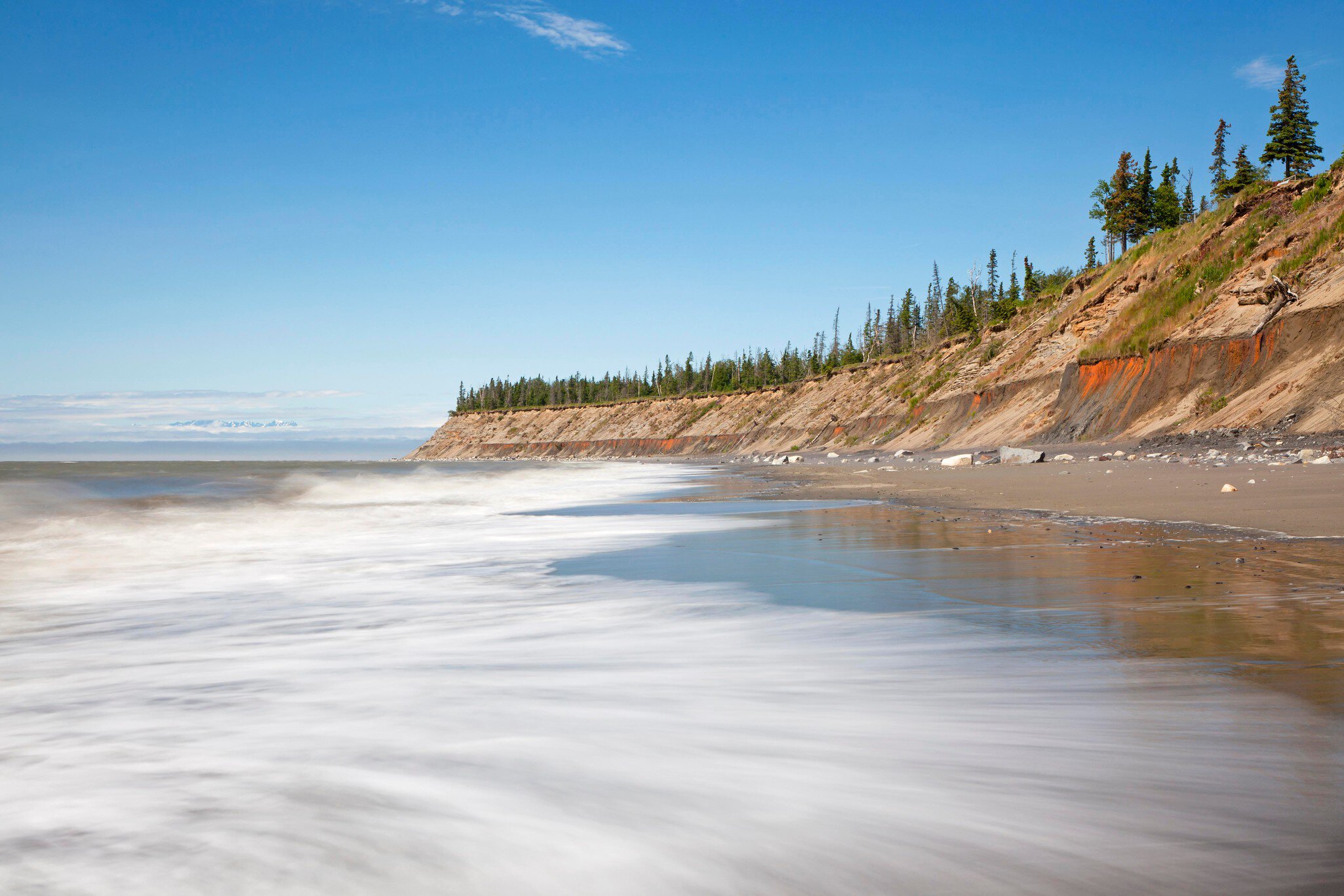 Surf on the beach of Kenai on the Kenai Peninsula, Cook Inlet, Alaska, USA; Shutterstock ID 1698199297;