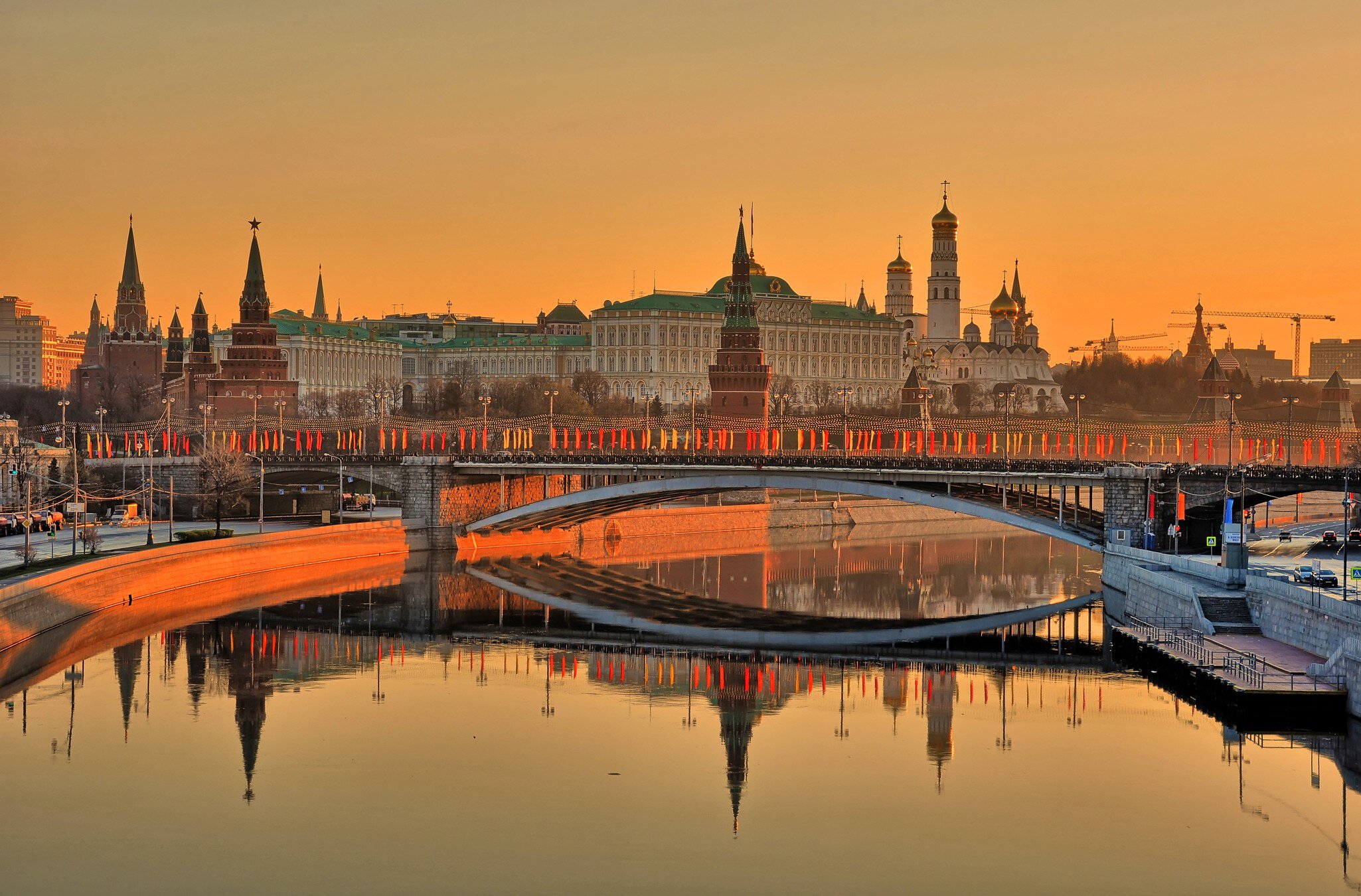 Sunrise at Moscow Kremlin, Russia.
yellow, sky, landscape, russia, sunrise, city, moscow, reflection, nature, river, travel, light, towers, bridge, summer, background, design, view, stars, roads, town, kremlin, picture, gloss, embankment, ussr, office, border, beams, shine, illumination, icon, route, government, tower bridge, government building, political, russian federation, river view, repulse, Moscow, Russia, view of city, kremlin in moscow