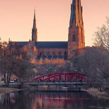Uppsala Cathedral on a spring evening viewed from Fyrisån