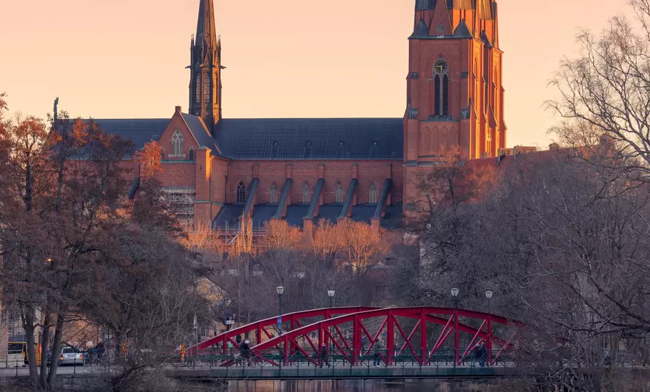 Uppsala Cathedral on a spring evening viewed from Fyrisån