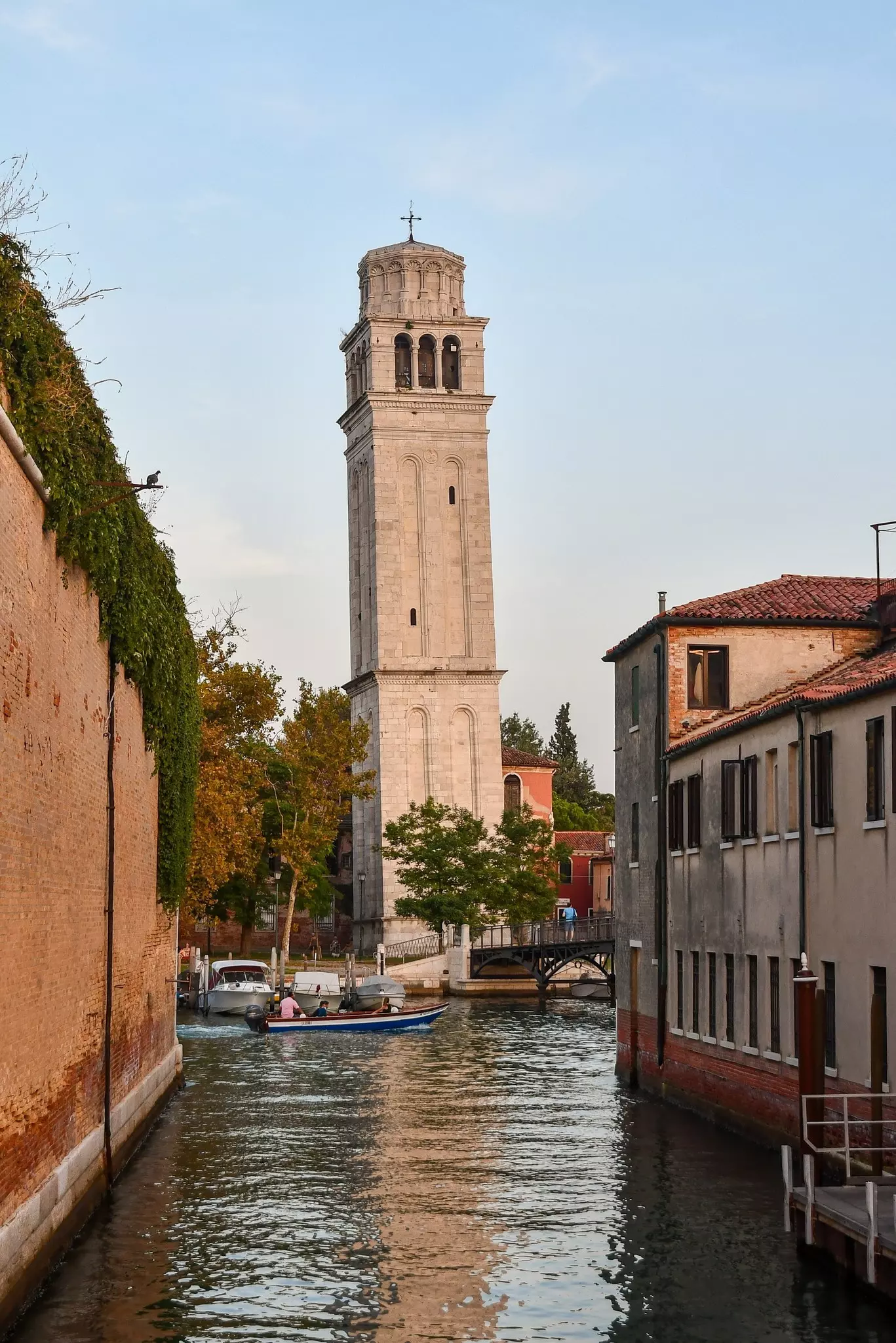 Venice, Veneto, Italy - 08 31 2024: Rio delle Vergini canal with the bell tower of the Basilica of San Pietro di Castello, on the island of the same name, at sunset, License Type: media, Download Time: 2025-07-01T19:12:50.000Z, User: lonelyplanetmedia, Editorial: true, purchase_order: 65050 - Digital Destinations and Articles, job: Global Publishing WIP, client: App, other: Pia Peterson Haggarty