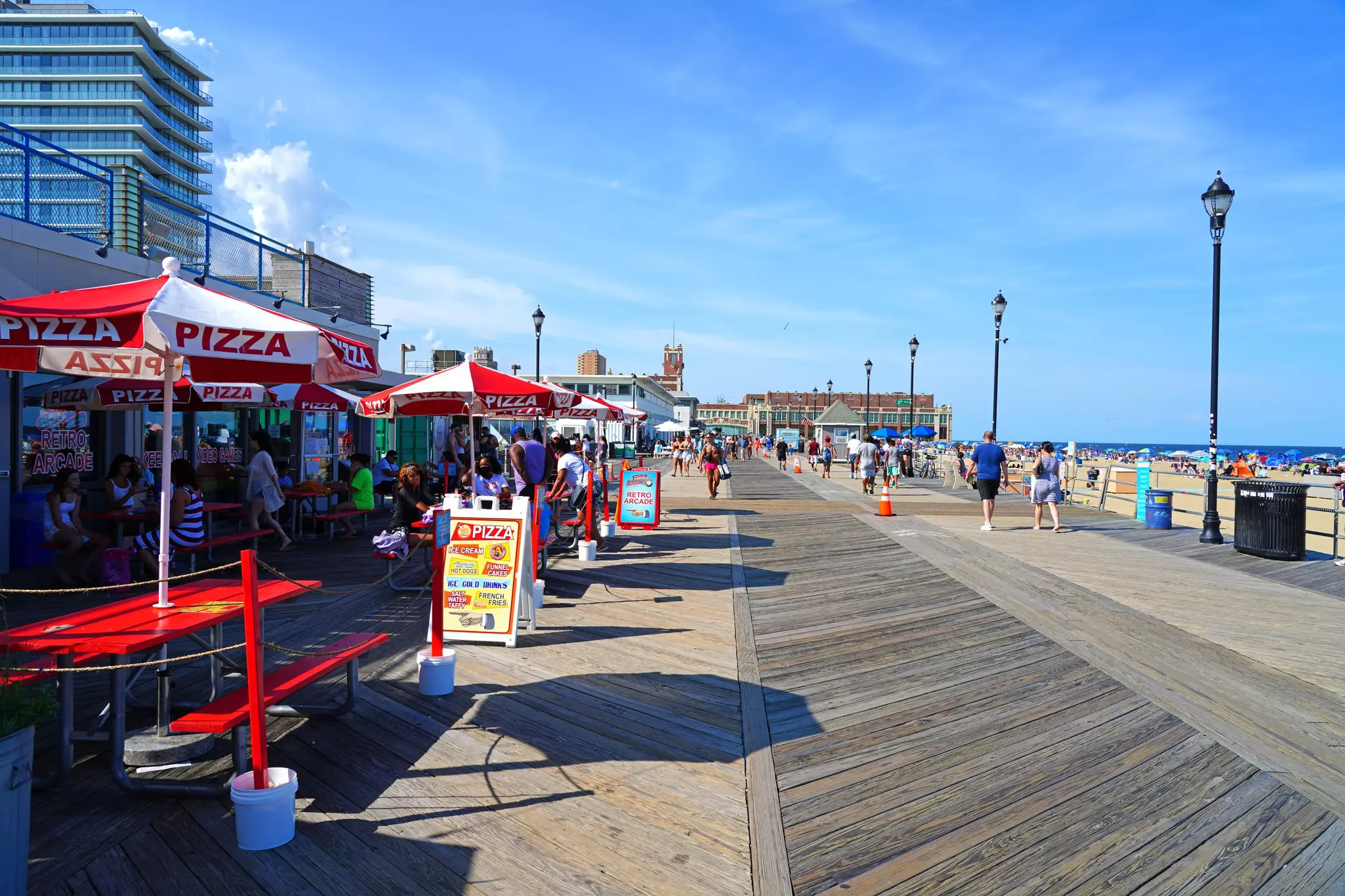 The busy boardwalk next to the beach at Asbury Park, New Jersey. 