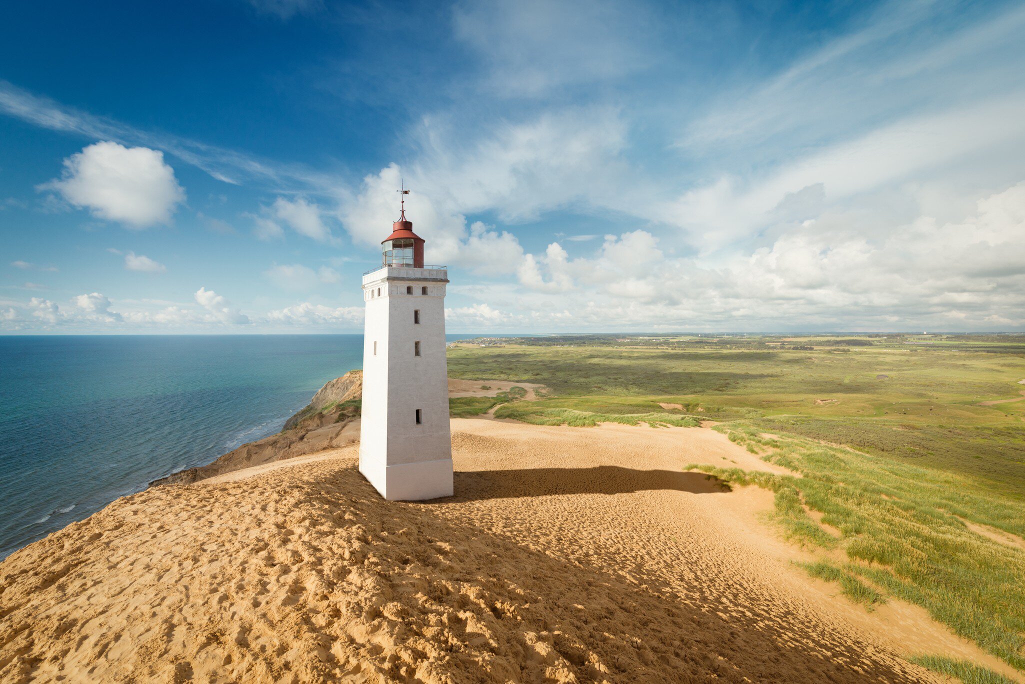 Rubjerg Knude lighthouse in the dunes. Jutland, Denmark.