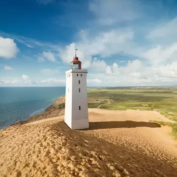 Rubjerg Knude lighthouse in the dunes. Jutland, Denmark.