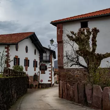 View of buildings in the village of Zugarramurdi in Spain.