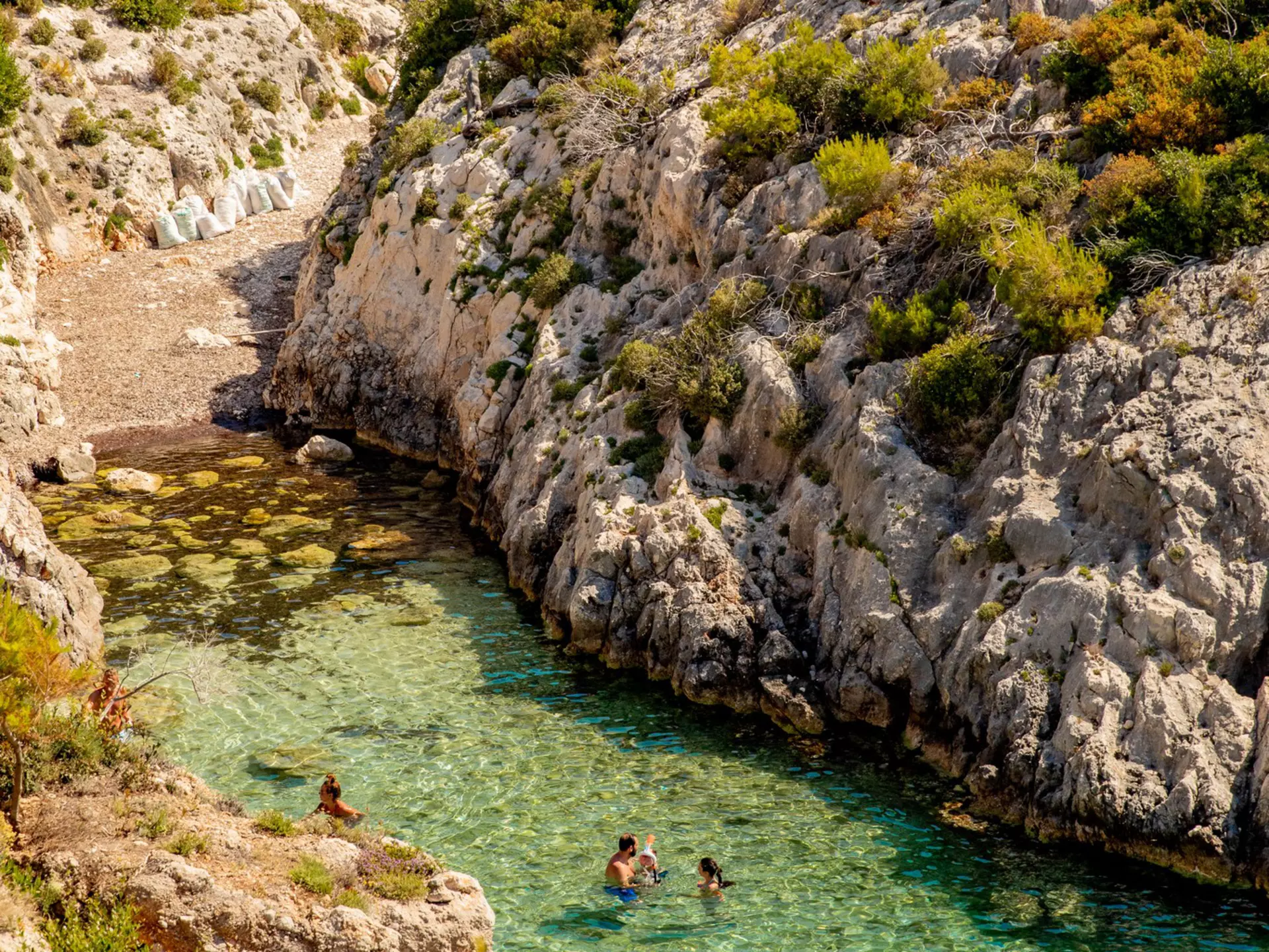 People relaxing in an little bay on Zakynthos (Zante, Ionian Islands, Greece)