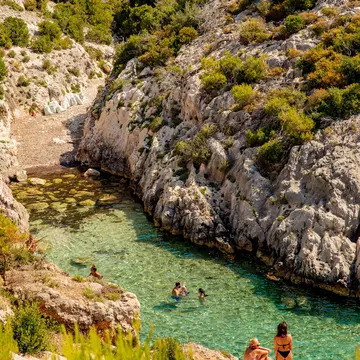 People relaxing in an little bay on Zakynthos (Zante, Ionian Islands, Greece)