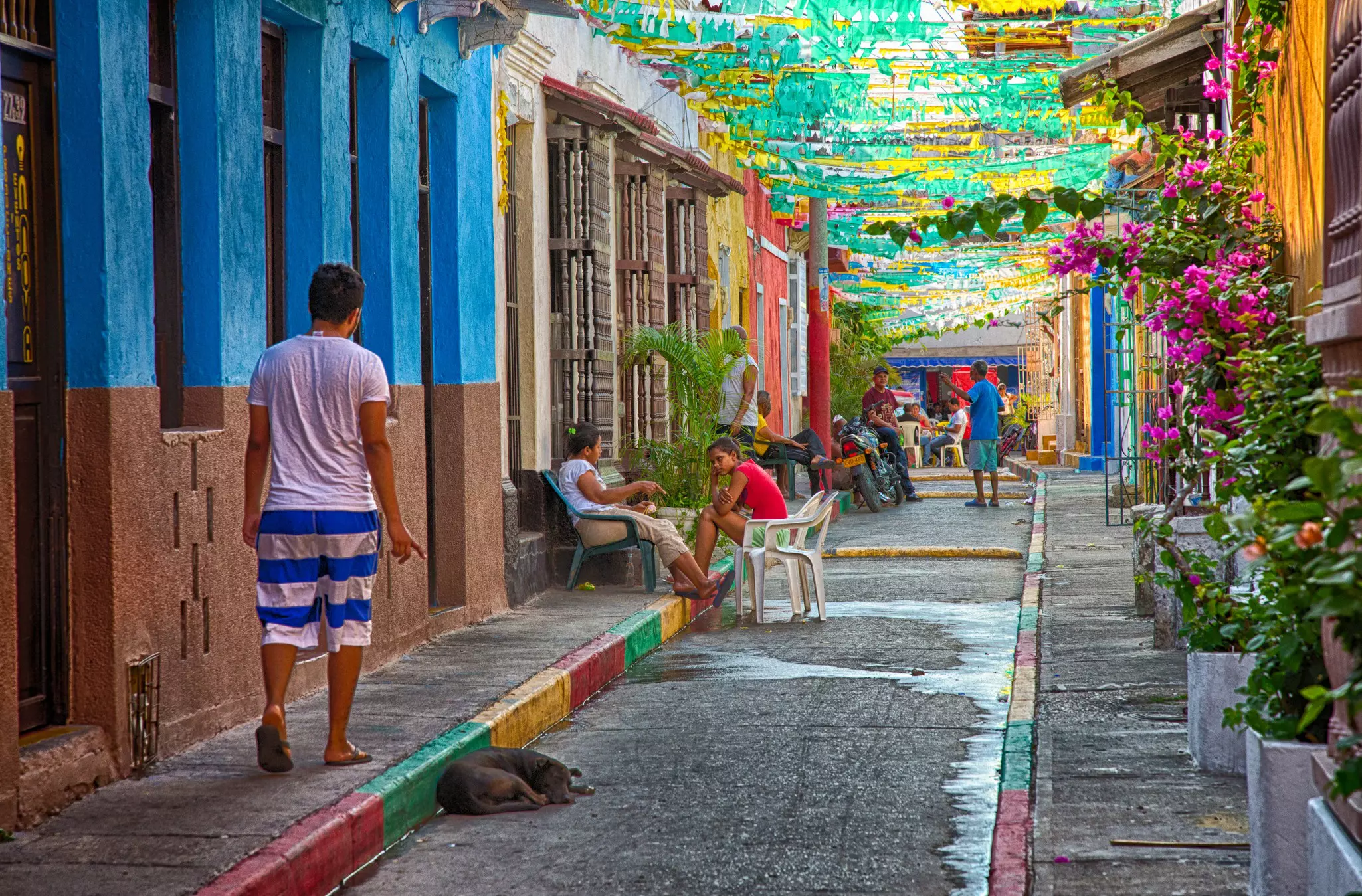 Save money by staying and going out in off-the-radar neighborhoods such as Cartagena's Getsemani © garytog / Getty Images