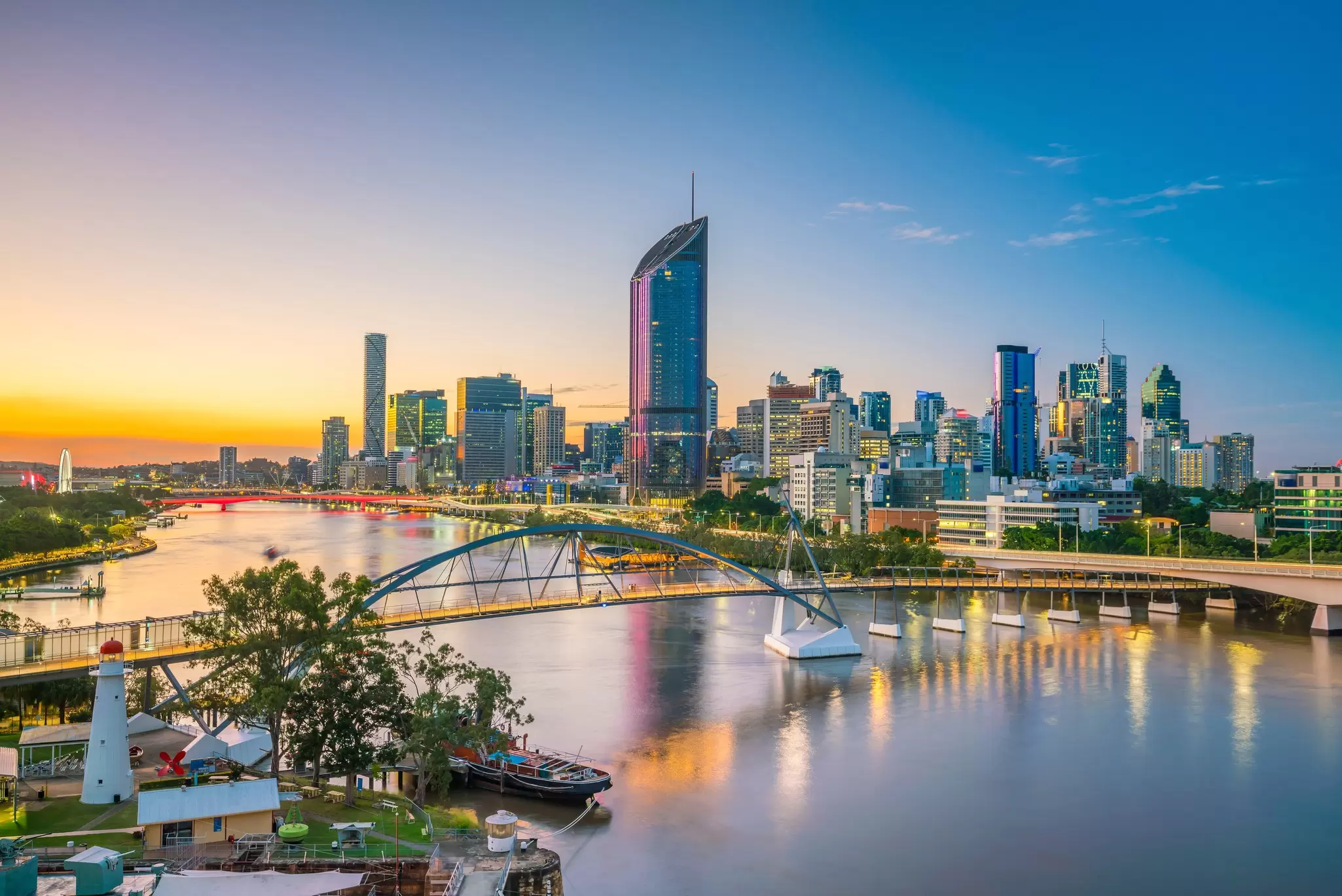 Brisbane's city skyline and river. f11photo / Shutterstock
