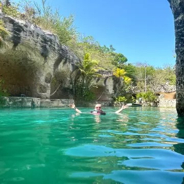 Lonely Planet editor Melissa Yeager floating the river surrounding the Hotel Xcaret México resort in Playa del Carmen © Melissa Yeager / Lonely Planet
