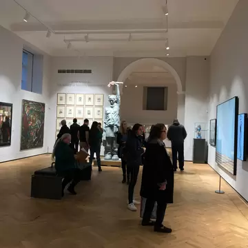 Aberdeen, Scotland / UK - December 8, 2019: Interiors of the Art Gallery in Aberdeen. Visitors standing in the middle of one of the art gallery halls looking at different photos placed on the walls., License Type: media, Download Time: 2026-03-02T19:59:36.000Z, User: LP_YKhanna, Editorial: true, purchase_order: 65050 - Digital Destinations and Articles, job: LP, client: App Content, other: Yuvraj Khanna