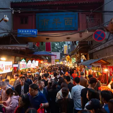 Xi'an, China  - October 7,2017: People and street vendor in the Muslim Quarter in Xi'an  License Type: media  Download Time: 2024-01-19T21:23:44.000Z  User: bhealy950  Is Editorial: Yes  purchase_order:   