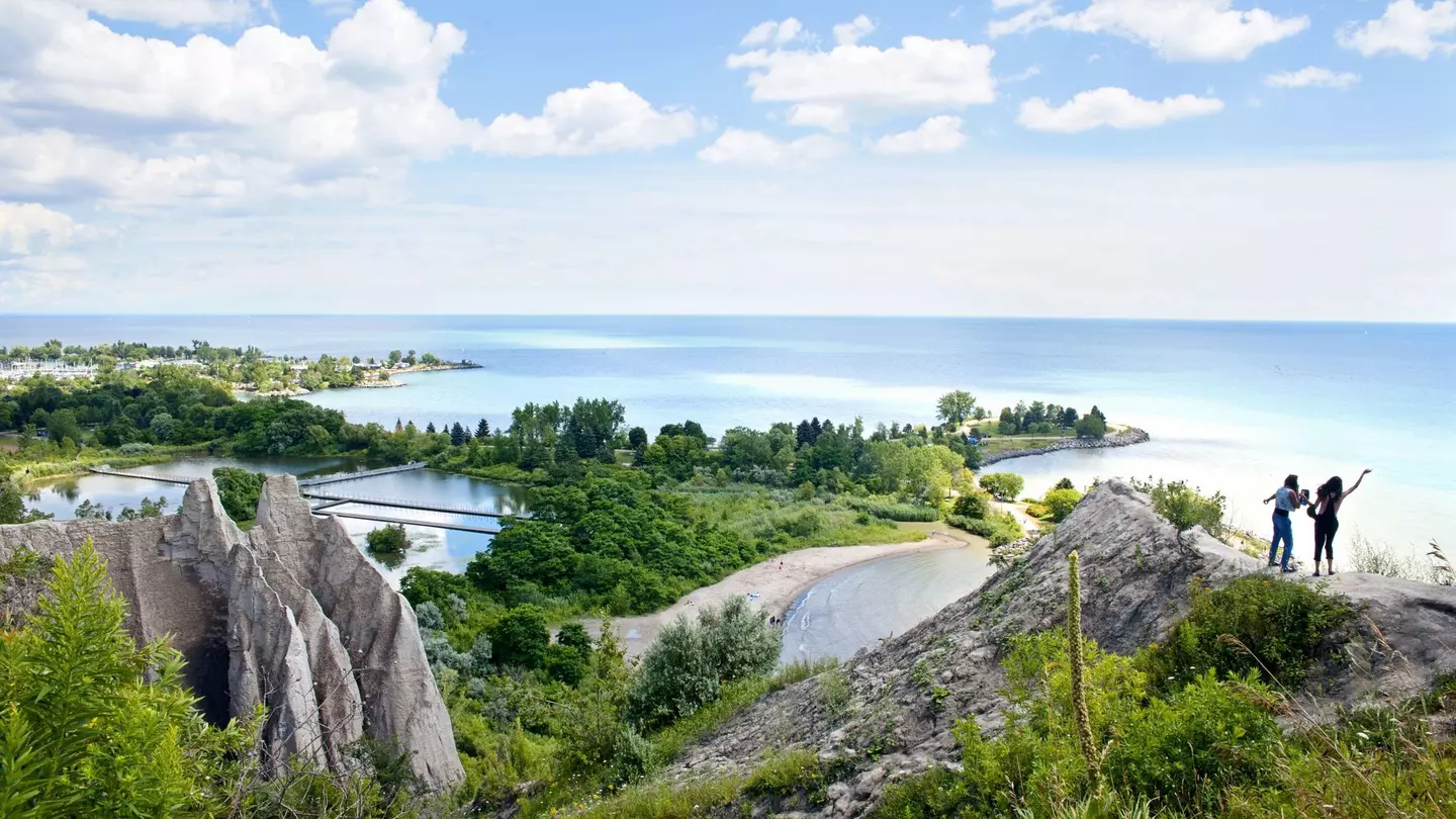 People looking over the shoreline from Scarborough Bluffs, Toronto