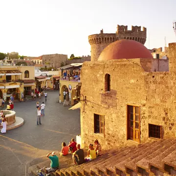 Sunset on ancient town square.