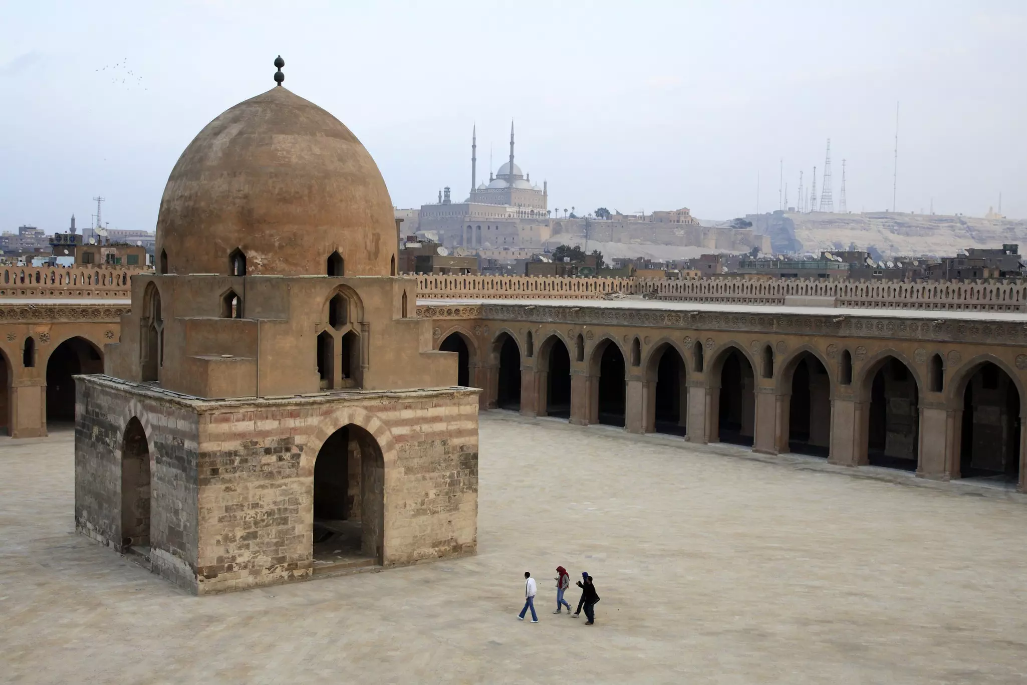 Ibn Tulun Mosque with Cairo Citadel in the background.