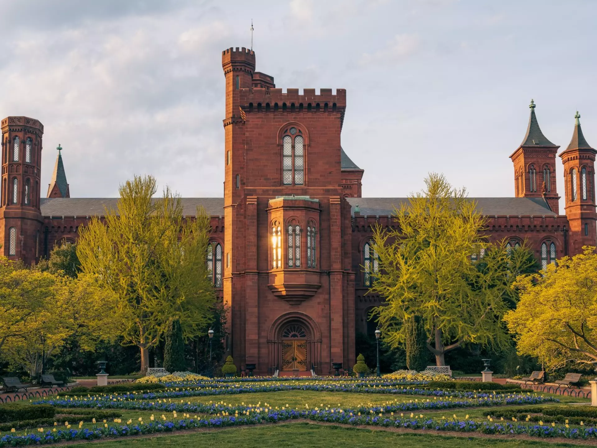 Smithsonian Institution Building (the Smithsonian Castle) viewed across the Enid A. Haupt Garden on the National Mall in Washington, DC., License Type: media, Download Time: 2026-05-21T17:02:18.000Z, User: katelyn.perry_lonelyplanet, Editorial: false, purchase_order: 65050 - Digital Destinations and Articles, job: wip, client: wip, other: Katelyn Perry