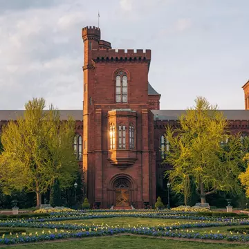 Smithsonian Institution Building (the Smithsonian Castle) viewed across the Enid A. Haupt Garden on the National Mall in Washington, DC., License Type: media, Download Time: 2026-05-21T17:02:18.000Z, User: katelyn.perry_lonelyplanet, Editorial: false, purchase_order: 65050 - Digital Destinations and Articles, job: wip, client: wip, other: Katelyn Perry