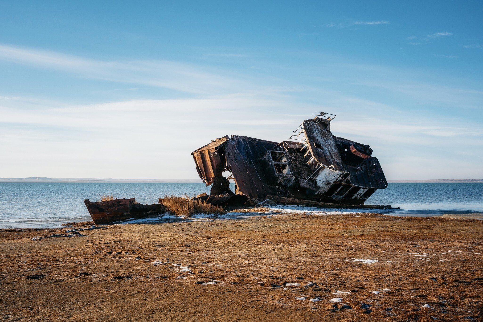 Ship remains on shore of Aral sea or Aral lake, Kazakhstan; Shutterstock ID 1568984863;