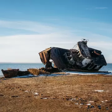 Ship remains on shore of Aral sea or Aral lake, Kazakhstan; Shutterstock ID 1568984863;