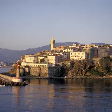 France, Corsica, Bastia, Terra-Nova And The Old Port At Sunrise, The Bell Tower Of Ste-Marie Church (Center Left)