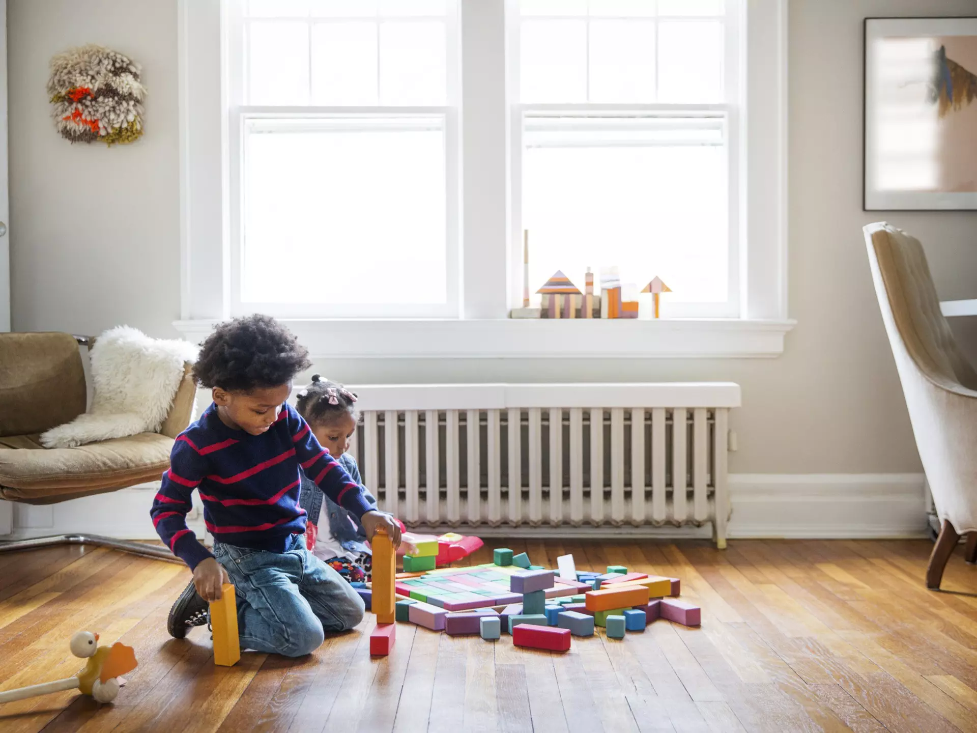 Get creative with junk modelling, or build landmarks with blocks. Cavan Images / Getty Images