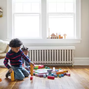 Get creative with junk modelling, or build landmarks with blocks. Cavan Images / Getty Images