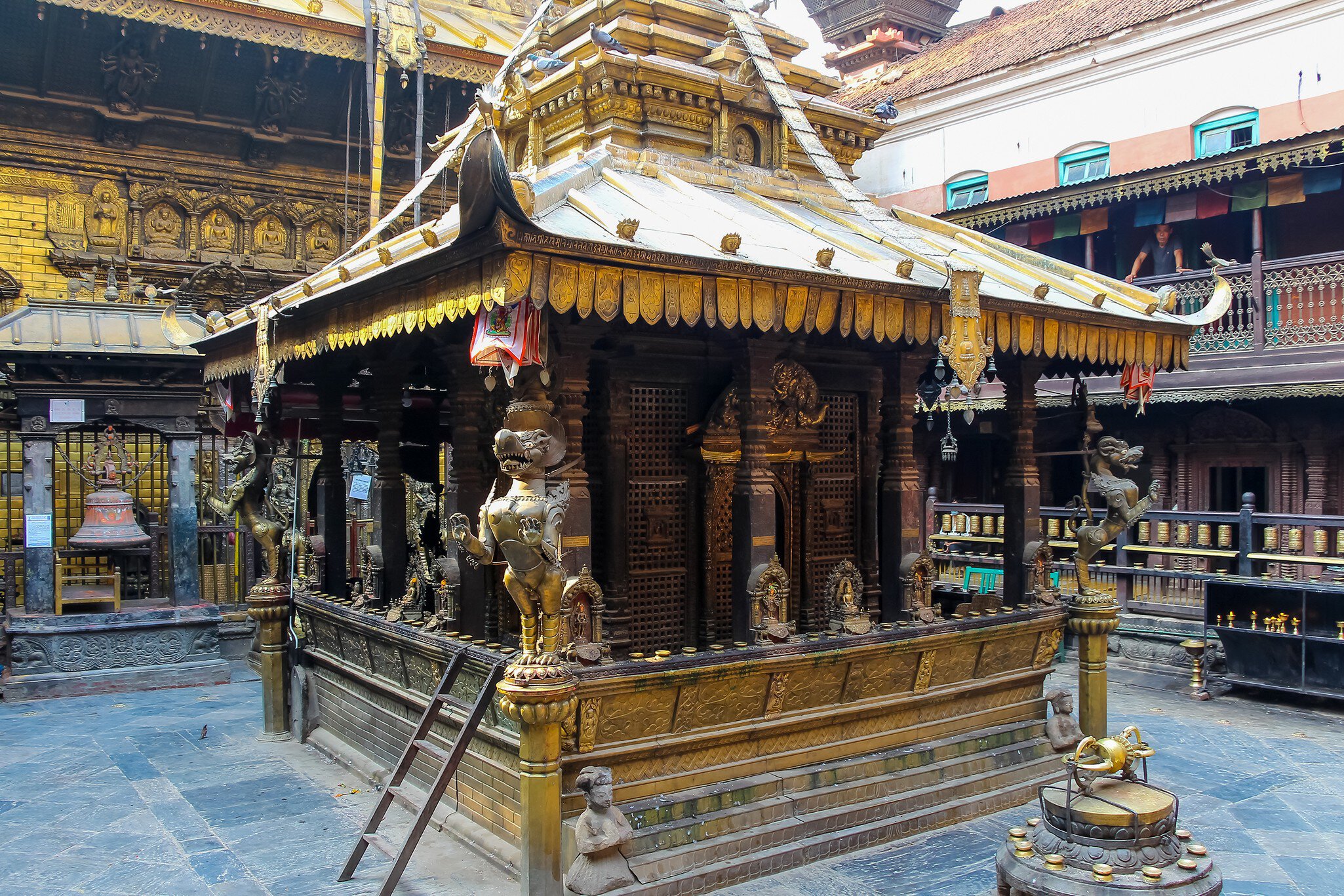 Nepal, Lalitpur - May 10, 2019: Hiranya Varna Mahavihar (The Golden Temple) buildings exterior in a sunny day in Lalitpur city, Nepal. Soft focus. Religious architecture theme.