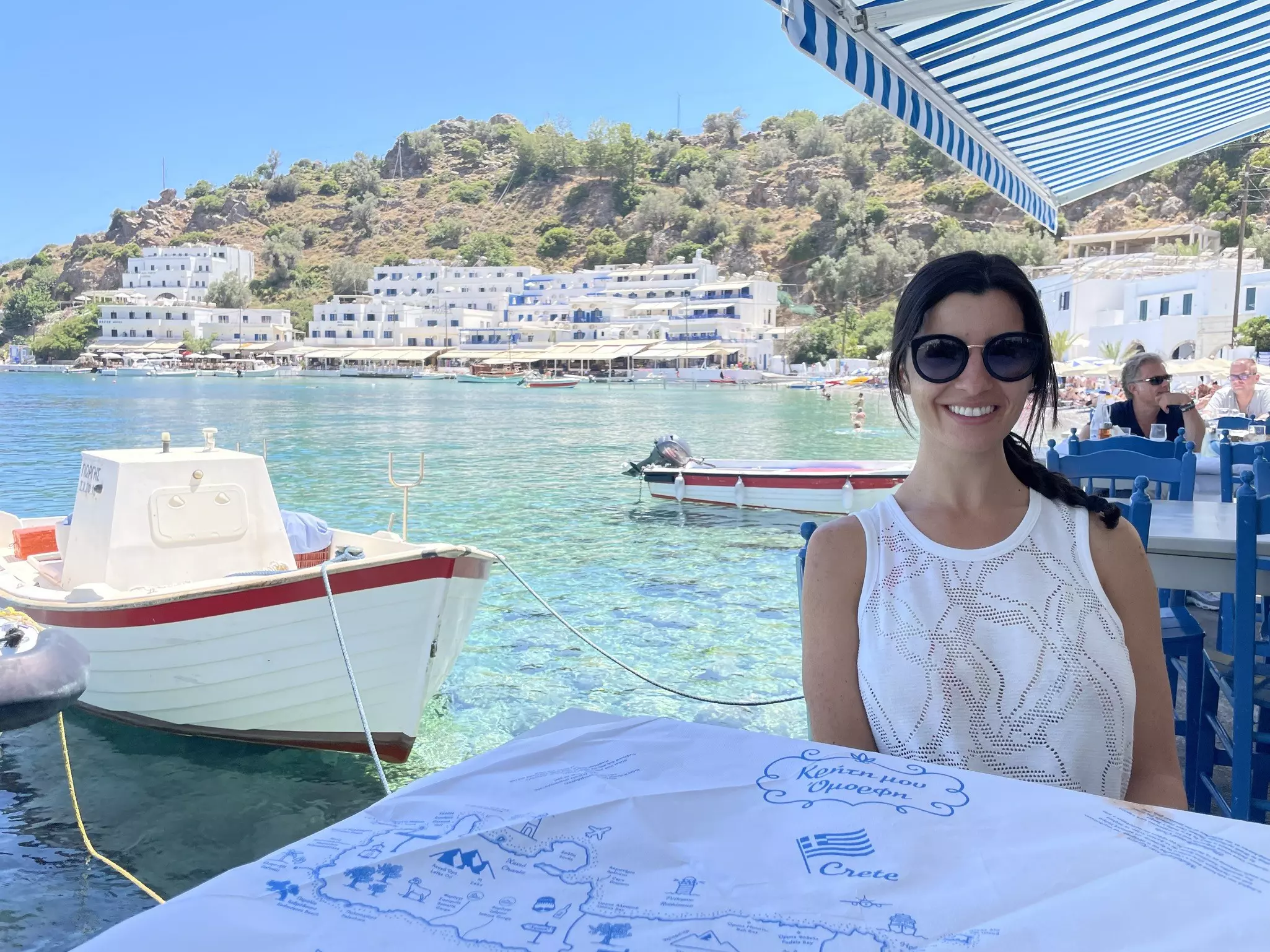 Lonely Planet writer Caterina Hrysomallis at a beachside cafe in Loutro, Crete