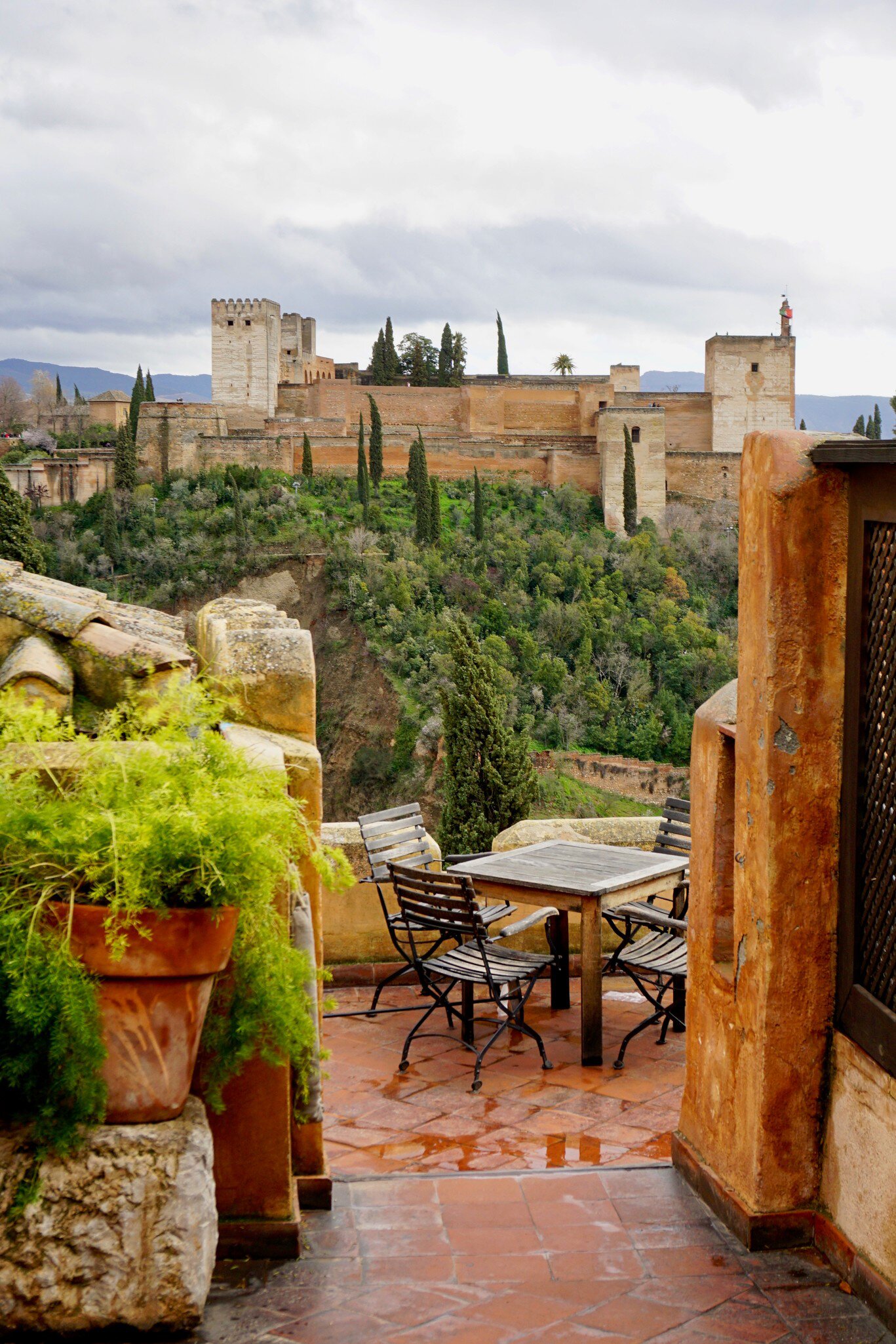 A European style table setting on a patio overlooking the Alhambra in Granada, Spain                           , License Type: media, Download Time: 2026-02-16T16:31:43.000Z, User: LP_YKhanna, Editorial: false, purchase_order: 65050 - Digital Destinations and Articles, job: LP, client: App Content, other: Yuvraj Khanna