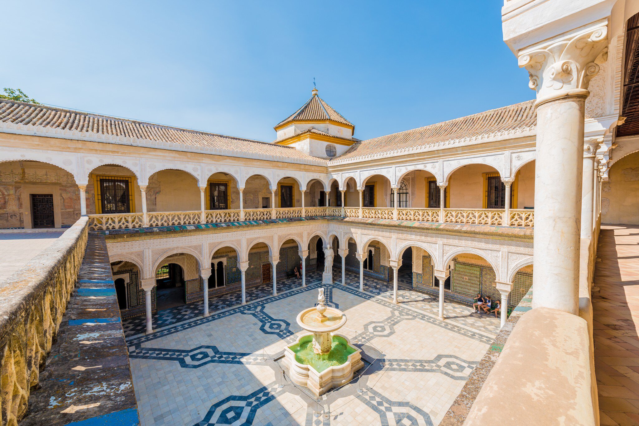 SEVILLE, ES - JULY 27, 2017: The Casa de Pilatos is a palace which combines the Italian Renaissance and Spanish Mudejar styles. It is considered the prototype of an Andalusian palace.; Shutterstock ID 1007589019;